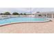 Inviting community pool with plenty of seating at 176 Philadelphia Lot 5 Blvd, Palm Harbor, FL 34684