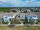 Community aerial view showcasing the neighborhood's attractive homes and tree-lined streets at 707 Winterside Dr, Apollo Beach, FL 33572