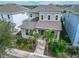 Beautiful home featuring lush landscaping, palm trees, and a welcoming front entrance at 707 Winterside Dr, Apollo Beach, FL 33572