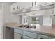 Kitchen features a pass-through to the living room and stainless steel sink at 1662 Seascape Cir # 205, Tarpon Springs, FL 34689