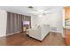 Living room with sectional sofa and view of kitchen at 5621 Moog Rd, New Port Richey, FL 34652