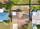 Overhead view of a house and surrounding homes at 5621 Moog Rd, New Port Richey, FL 34652