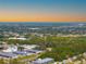 Aerial view showing a wide expanse of land and the ocean in the background at 5621 Moog Rd, New Port Richey, FL 34652