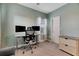 Home office featuring a standing desk and two monitors at 707 Winterside Dr, Apollo Beach, FL 33572