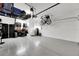 Garage with overhead storage and work area at 707 Winterside Dr, Apollo Beach, FL 33572