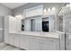 Bathroom boasts double sinks, ample counter space, and a large shower at 707 Winterside Dr, Apollo Beach, FL 33572