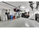 Organized garage with overhead storage and work bench at 707 Winterside Dr, Apollo Beach, FL 33572
