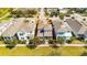 Aerial view showcasing a two-story house in a residential neighborhood at 707 Winterside Dr, Apollo Beach, FL 33572