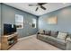 Serene loft space, great for relaxation with a TV and couch at 707 Winterside Dr, Apollo Beach, FL 33572
