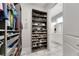 Large walk-in closet with custom shelving and ample storage space at 707 Winterside Dr, Apollo Beach, FL 33572