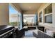 Relaxing screened porch with seating and fire pit at 707 Winterside Dr, Apollo Beach, FL 33572