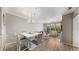 Dining area with a white table and gray chairs at 2717 Via Cipriani # 622B, Clearwater, FL 33764