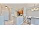 Bright dining area with kitchen and entryway views at 2717 Via Cipriani # 622B, Clearwater, FL 33764