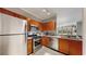 Modern kitchen with stainless steel appliances and granite countertops at 2717 Via Cipriani # 622B, Clearwater, FL 33764