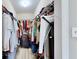 Large walk-in closet with ample shelving and hanging space at 2717 Via Cipriani # 622B, Clearwater, FL 33764