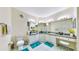 Large bathroom with double sinks and updated fixtures at 2717 Via Cipriani # 622B, Clearwater, FL 33764