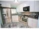 Updated kitchen with stainless steel appliances and granite countertops at 1901 Oyster Catcher Ln # 814, Clearwater, FL 33762