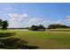 Peaceful green golf course with pond and lush landscaping at 1901 Oyster Catcher Ln # 814, Clearwater, FL 33762