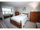 Bright bedroom with wooden furniture and a window seat at 1901 Oyster Catcher Ln # 814, Clearwater, FL 33762