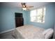 Light blue bedroom with a queen bed and large window at 1901 Oyster Catcher Ln # 814, Clearwater, FL 33762