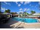 Inviting community pool with lounge chairs and patio tables at 1901 Oyster Catcher Ln # 814, Clearwater, FL 33762