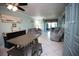 Open living area with sofa, chairs, and dining table at 1901 Oyster Catcher Ln # 814, Clearwater, FL 33762