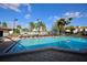 Sparkling community pool with plenty of lounge chairs at 1901 Oyster Catcher Ln # 814, Clearwater, FL 33762