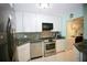 Well-equipped kitchen with stainless steel appliances and granite countertops at 1901 Oyster Catcher Ln # 814, Clearwater, FL 33762