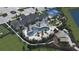 Aerial view of community clubhouse, pool, and recreational areas at 6659 Michael Favor Way, Wesley Chapel, FL 33545