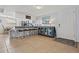 Inviting entryway with kitchen bar and storage cabinet at 19725 Gulf Blvd # 20, Indian Shores, FL 33785