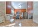 Well-equipped kitchen with stainless steel appliances and wood cabinets at 5725 80Th N St # 316, St Petersburg, FL 33709