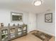 Bright entryway with a storage cabinet and decorative wall art at 19725 Gulf Blvd # 20, Indian Shores, FL 33785