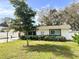 Charming single story home with a landscaped lawn and modern updates at 2600 Robinson Ave, Sarasota, FL 34232