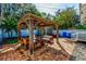 Outdoor patio area with pergola and seating at 615 Grove N St, St Petersburg, FL 33701