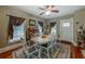 Bright dining room featuring a white table and six chairs at 615 Grove N St, St Petersburg, FL 33701