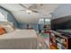 Spacious main bedroom with hardwood floors and ceiling fan at 615 Grove N St, St Petersburg, FL 33701