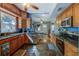 Updated kitchen with wood cabinets, granite counters, and stainless steel appliances at 615 Grove N St, St Petersburg, FL 33701