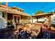 Brick patio with wooden dining set and gazebo at 615 Grove N St, St Petersburg, FL 33701