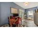 Bright home office features built-in desk, hardwood floors, and access to private balcony at 615 Grove N St, St Petersburg, FL 33701