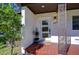 Inviting front door entry with updated features and a modern design at 1802 E Hamilton Ave, Tampa, FL 33610