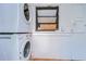 Laundry room with stacked LG washer and dryer at 1802 E Hamilton Ave, Tampa, FL 33610