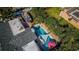 Relaxing pool area with shade structure and patio at 13191 92Nd Ave, Seminole, FL 33776