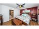 Bright bedroom with wood flooring and access to patio at 13191 92Nd Ave, Seminole, FL 33776