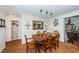 Bright dining room with wood table and chairs, and access to bathroom at 13191 92Nd Ave, Seminole, FL 33776