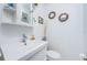 Small bathroom with single sink and white toilet at 13191 92Nd Ave, Seminole, FL 33776