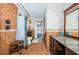 Bathroom with shower, granite countertop, and tiled floors at 13191 92Nd Ave, Seminole, FL 33776