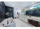 Spa-like bathroom with double vanity, soaking tub, and walk-in shower at 13191 92Nd Ave, Seminole, FL 33776