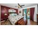 Cozy bedroom with wood flooring and a view of the backyard at 13191 92Nd Ave, Seminole, FL 33776