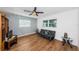 Guest bedroom with wood floors and built-in shelving at 13191 92Nd Ave, Seminole, FL 33776