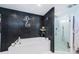 Bathroom with soaking tub, walk-in shower, and mosaic tile at 13191 92Nd Ave, Seminole, FL 33776